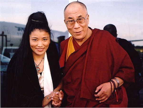 With Tibet's spiritual leader.